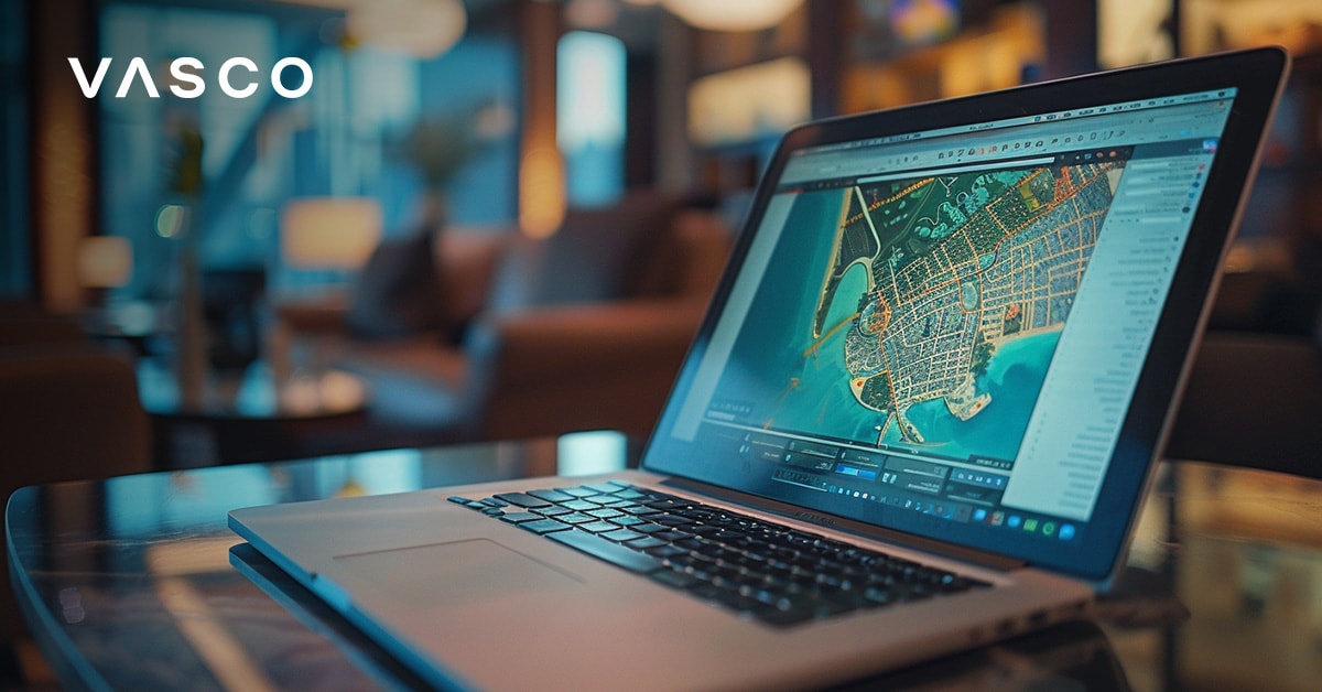 Notebook s otevřenou mapou Dubaje, na které je zobrazeno plánování cesty s Vasco